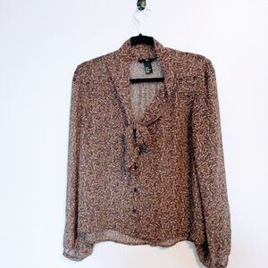H&M sheer blouse with pussybow and button front, great blouse for work. Floral